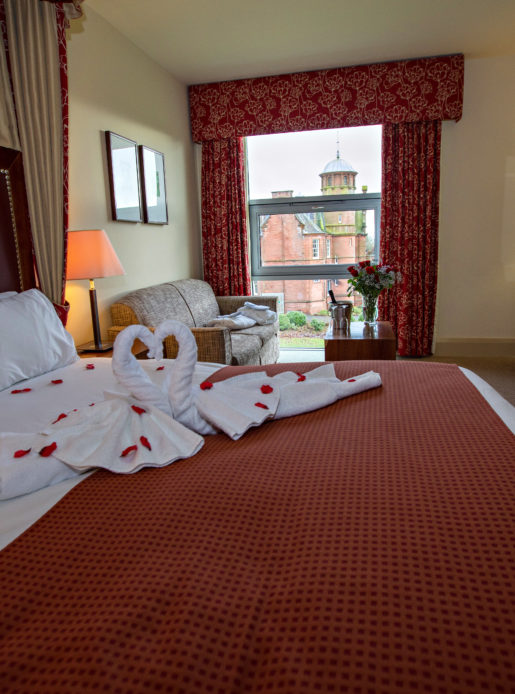 Holiday Inn Dumfries Bridal Suite with roses, champagne and towel swans